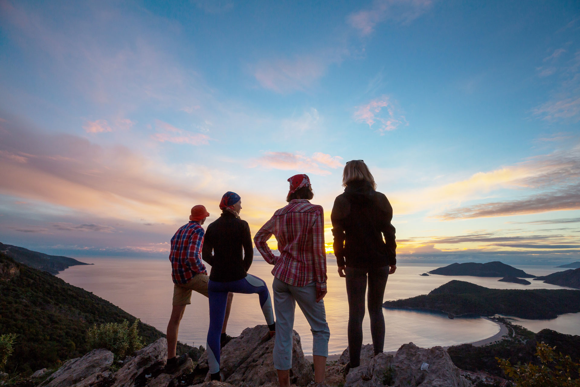 Group admiring sunset from a mountain, a moment in an Experiential Therapy Program Group admiring sunset from a mountain, a moment in an Experiential Therapy Program