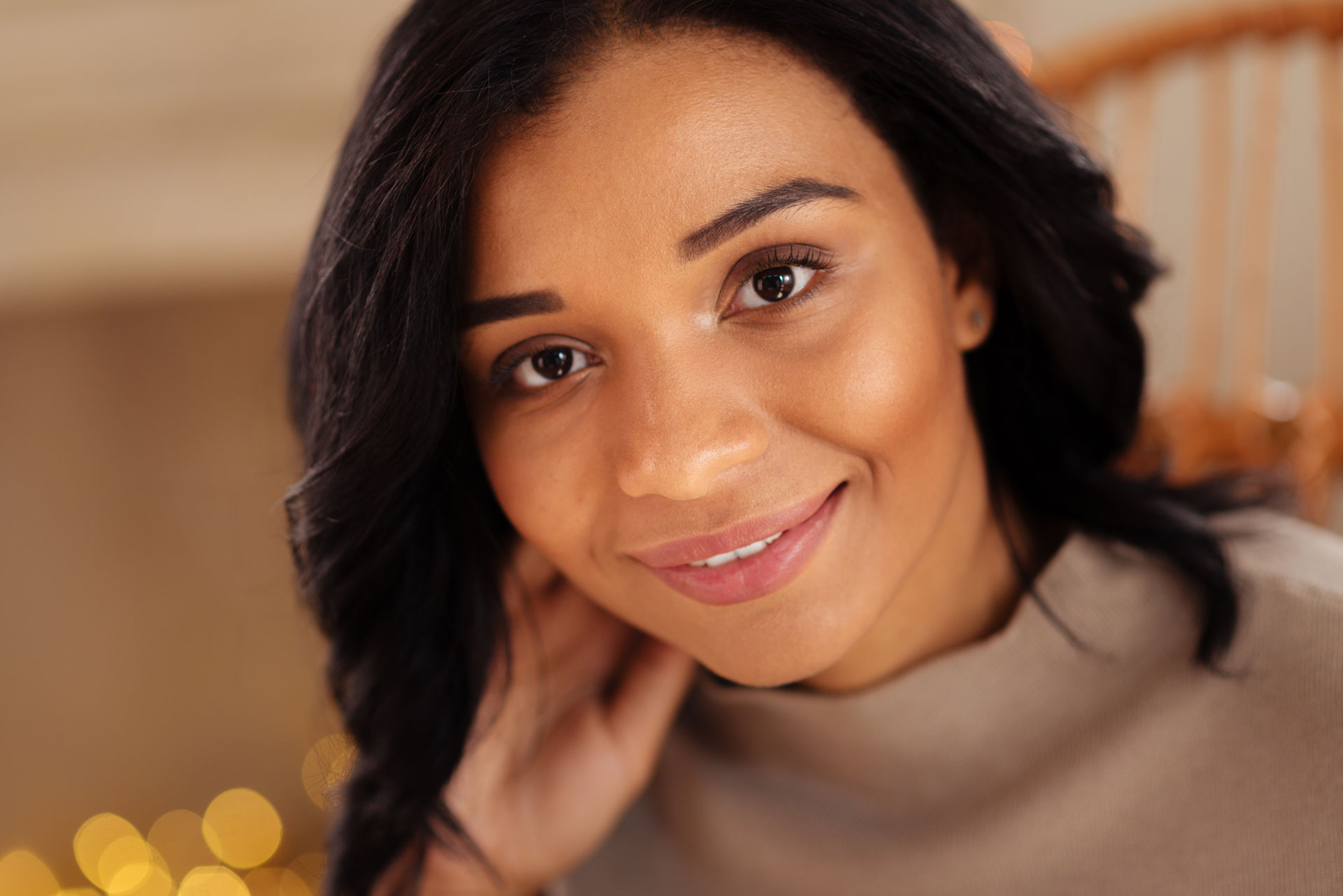 Young female smiling confidently, embodying the positivity found in Behavioral Health Programs
