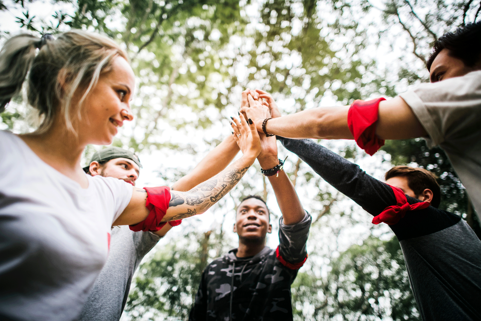 Diverse group of people joining hands in a show of unity and support reflecting the community aspect of substance abuse and mental health services Diverse group of people joining hands in a show of unity and support reflecting the community aspect of substance abuse and mental health services