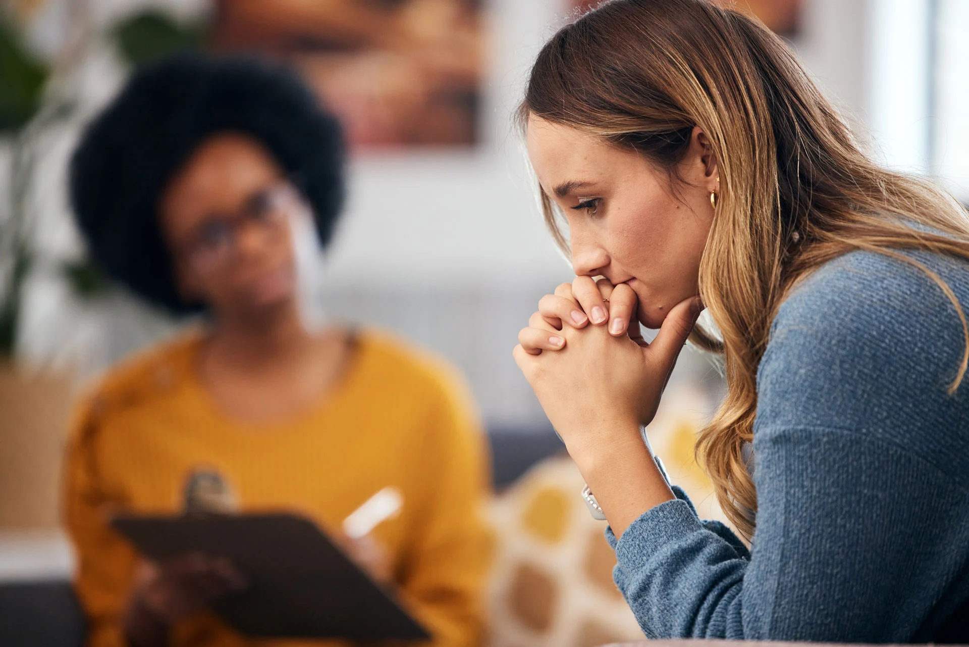 a woman in a pensive state