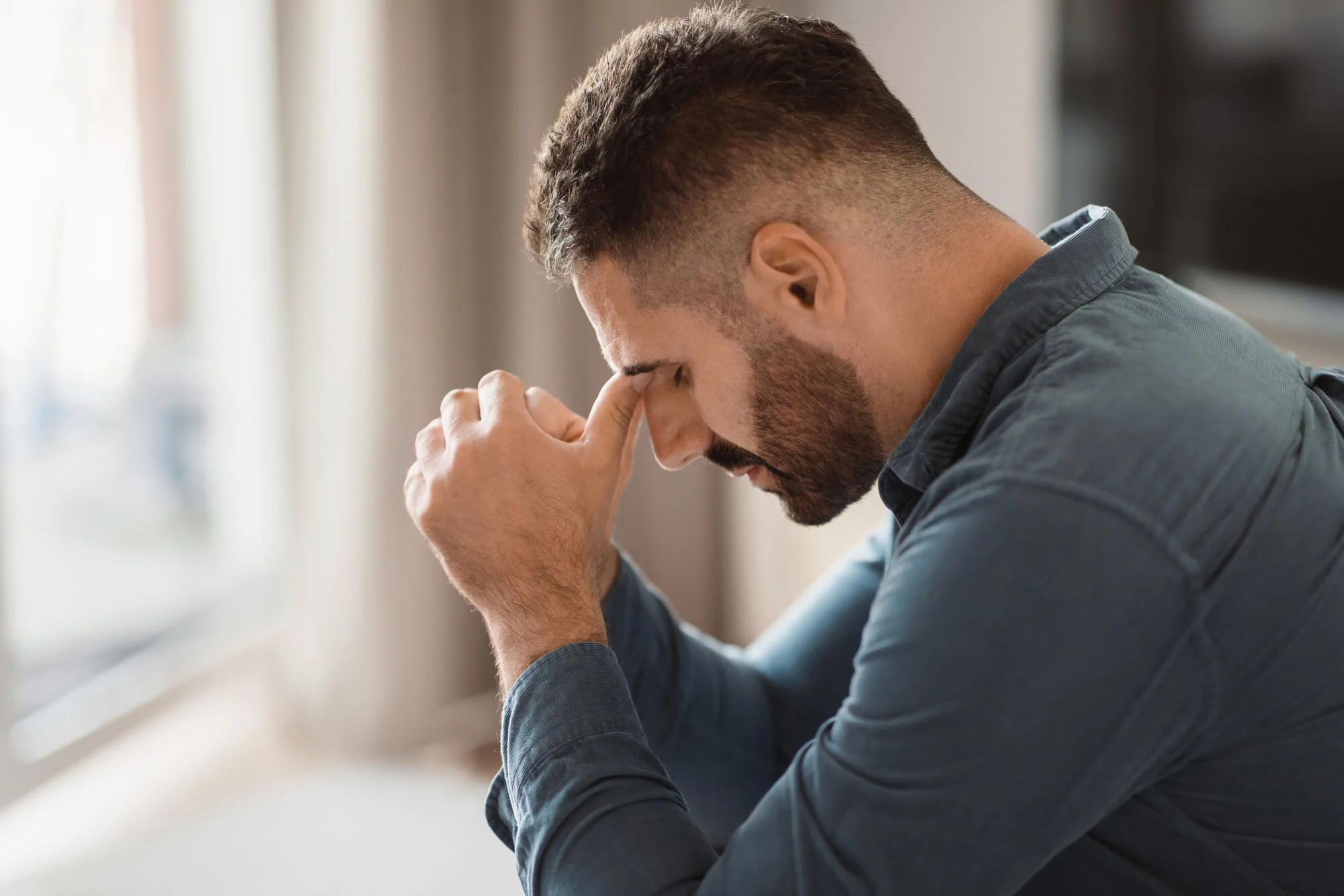Mental Health Treatment In Kalispell, Mt 1 depressed middle aged man grapples with grief