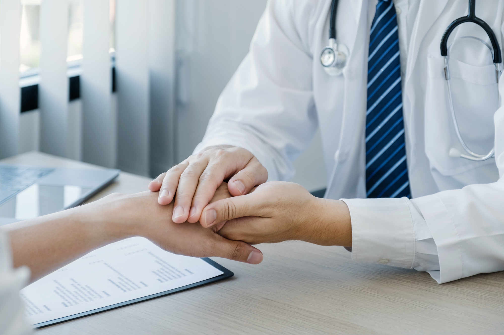 Doctor talking with a patient, symbolizing accessible mental health services through BCBSMT