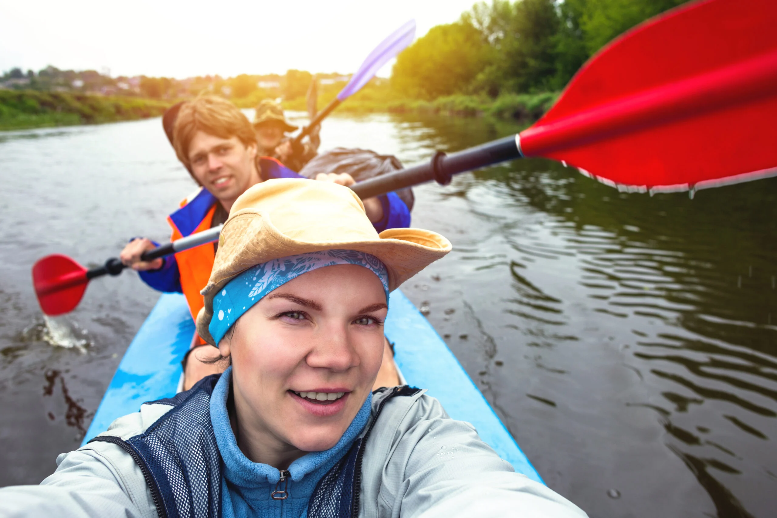 friends kayaking together, part of aftercare support services