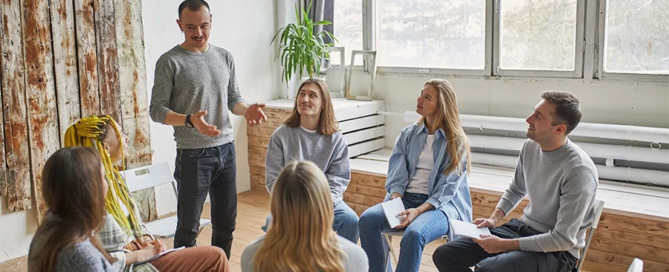 individuals struggling with excessive alcohol use are undergoing group therapy for substance abuse.