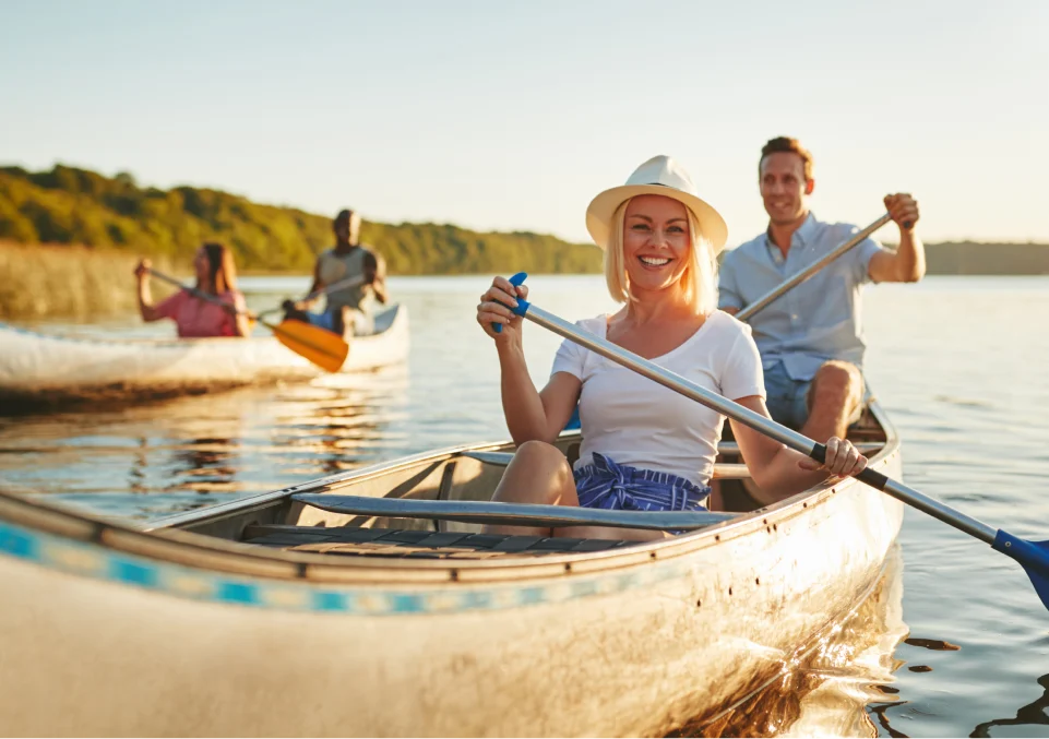 couples canoeing together, promoting well-being in a montana outdoor program