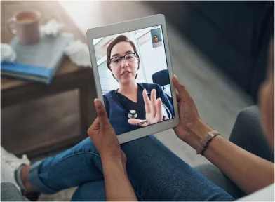 Rectangle 85 (5) person consults health care providers via tablet