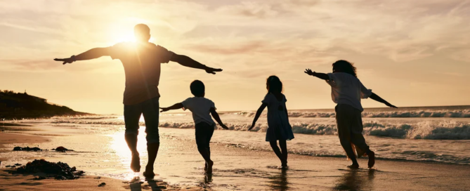 signs of drug addiction featured image - silhouette, family is running on beach and back view with ocean waves, sunset and bonding in nature.