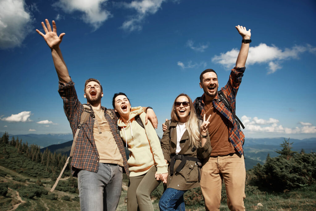 group adventure therapy aftercare for addiction to gambling Smiling people participating at a group therapy session for kratom treatment program