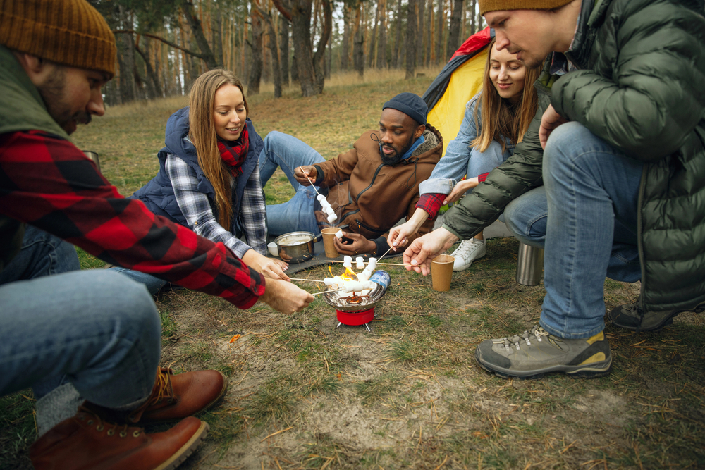 Group of individuals having an outdoor activity as part of their mental health treatment.