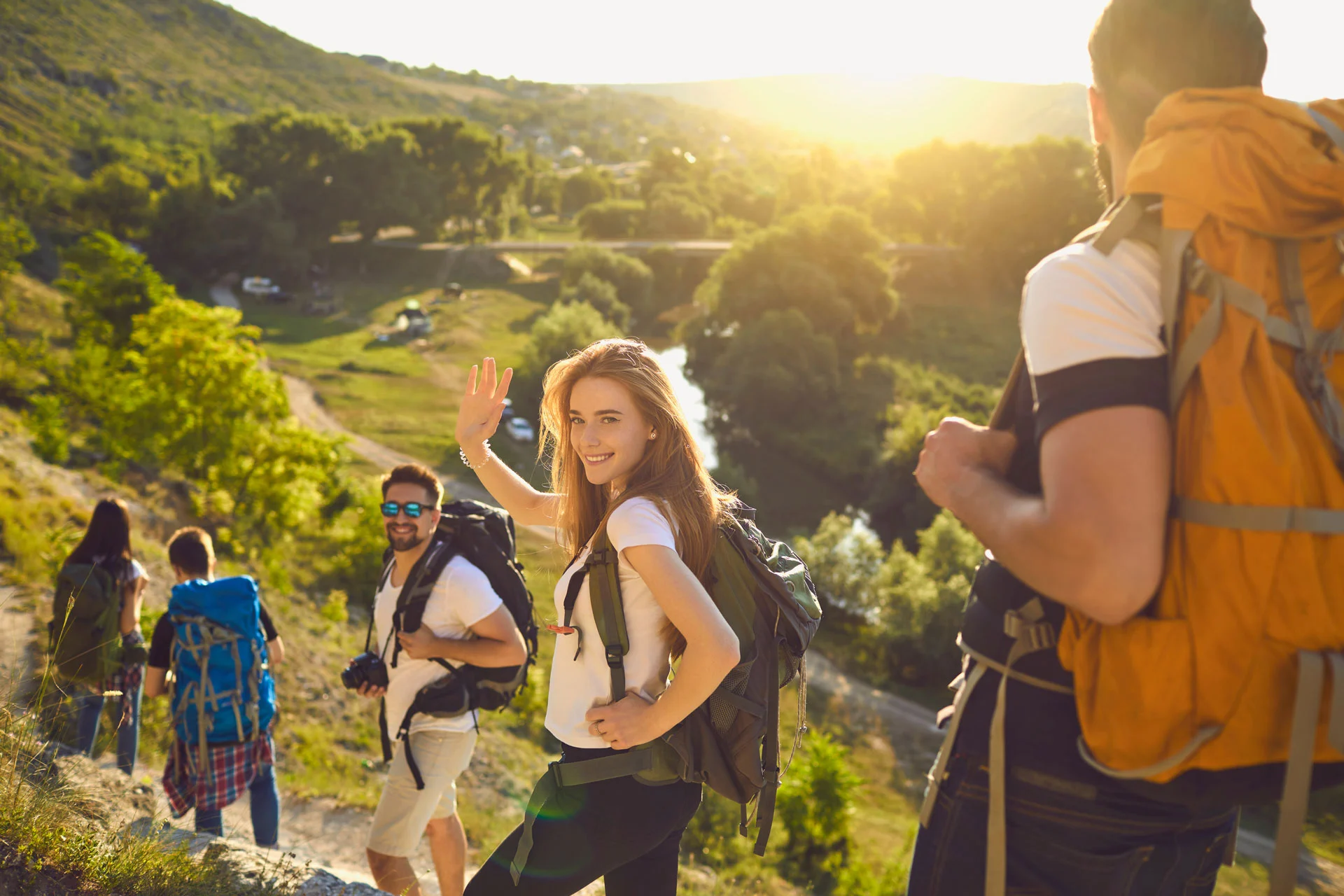 group of friends hiking in nature, promoting mental health and ptsd recovery