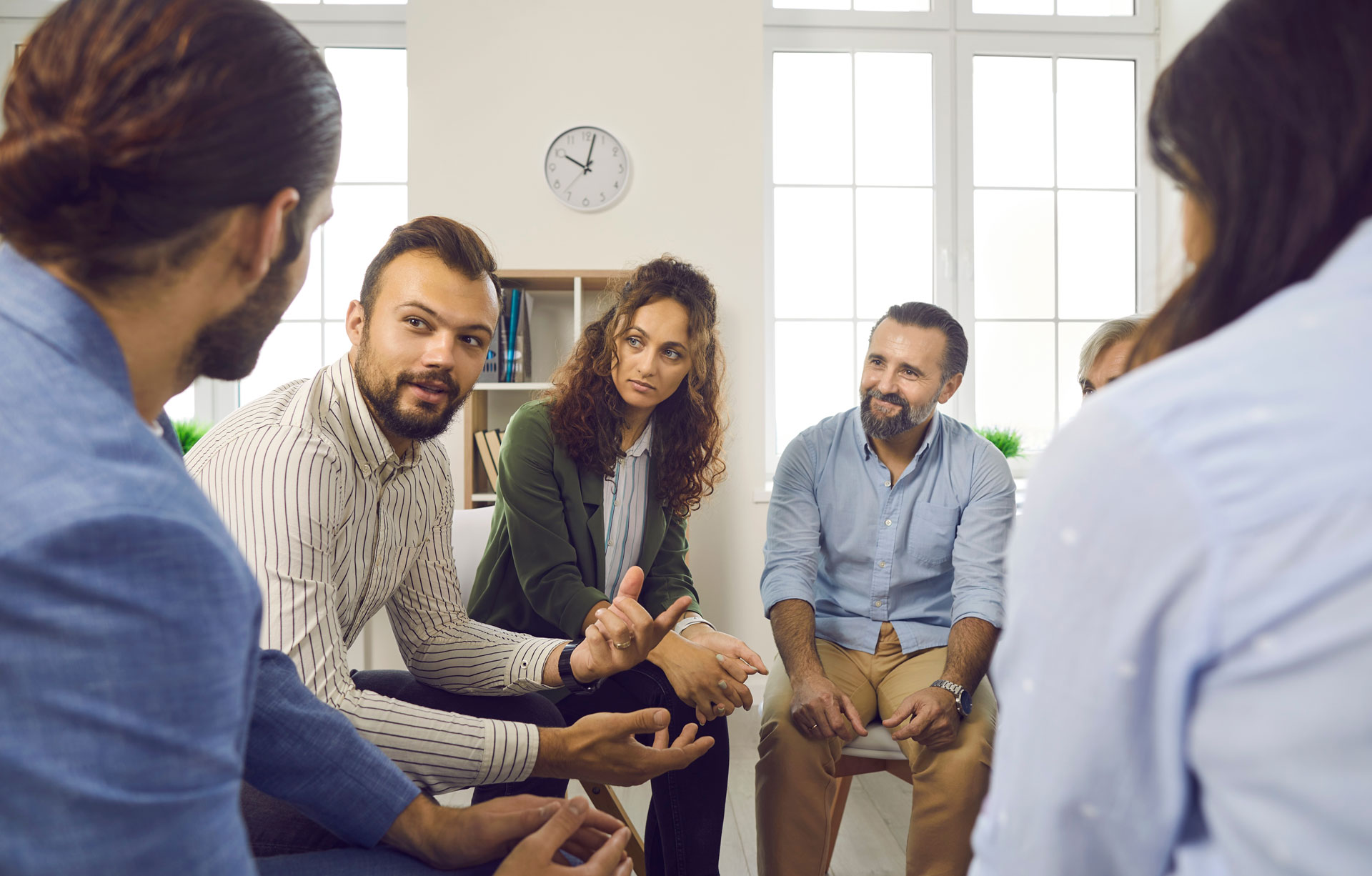 Group therapy session at an outpatient counseling center