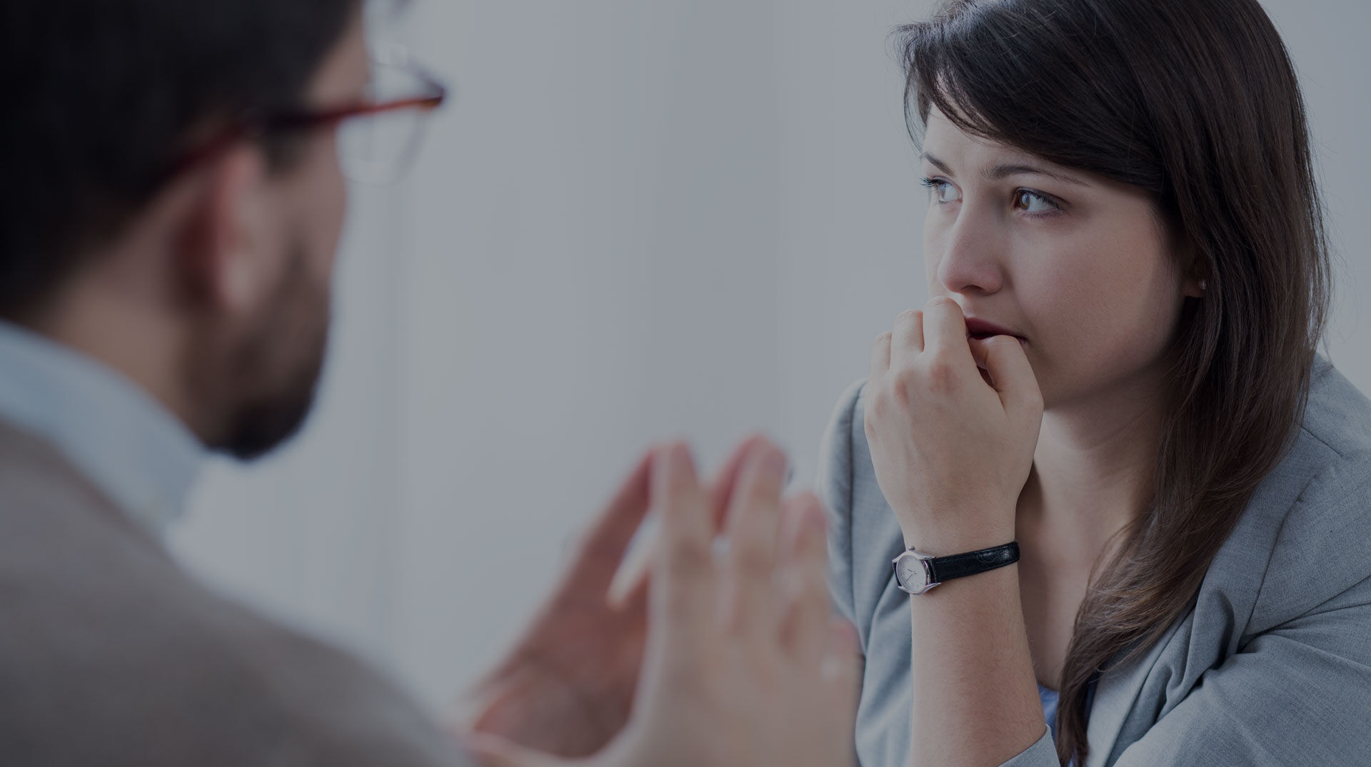 Concerned Woman In A Counseling Session, Potentially Engaging In An Anxiety Management Discussion. Concerned woman in a counseling session, potentially engaging in an anxiety treatment program.