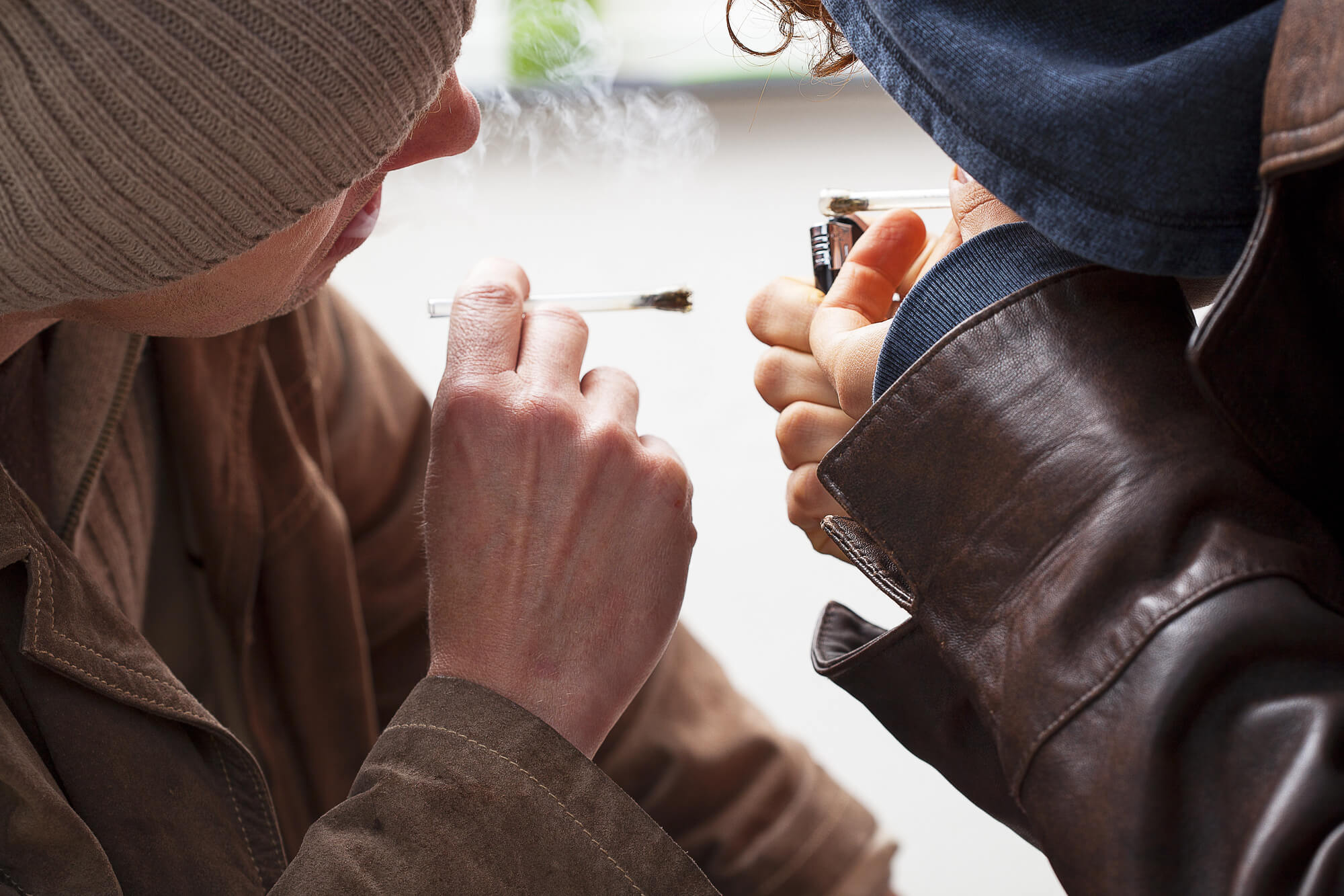 young couple smoking weed Art therapy session in progress, potentially for substance recovery programs